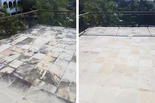 Stone tile patio floor before and after pressure cleaning