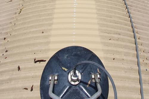 High pressure cleaning machine on roof