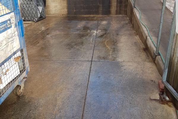 Restaurant loading bay before pressure cleaning