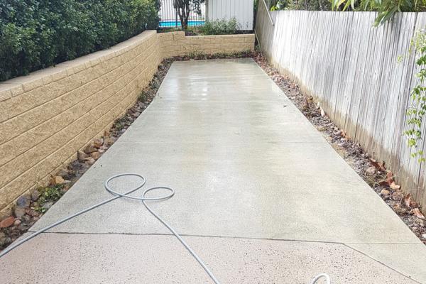 Clean garden driveway after pressure cleaning