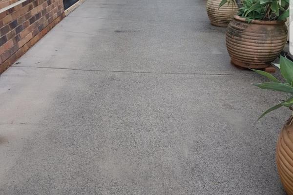 Clean pool deck area after pressure cleaning photo