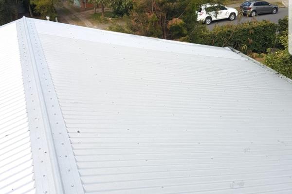 Immaculate white clean roof after pressure cleaning