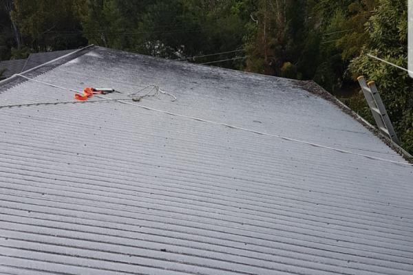 Dirty white roof before photo