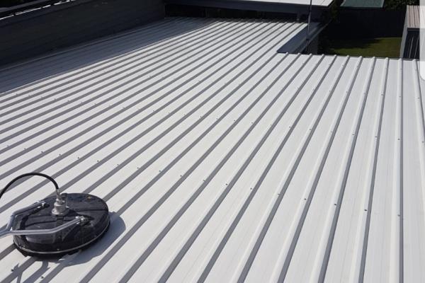Spotless roof with pressure washing machine after cleaning