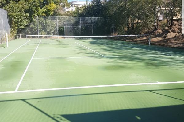 Clean tennis court after photo